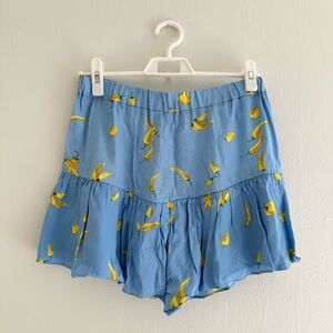 Zara yellow peppers and blue skirt